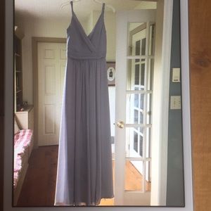 Pale grey gown.
